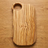 The Alba Olive Wood Board with Grip Hole seen from above, the full grain readable