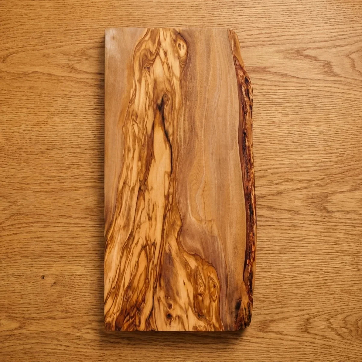 The Alba Live-Edge Olive Wood Slab seen from above, the full grain readable
