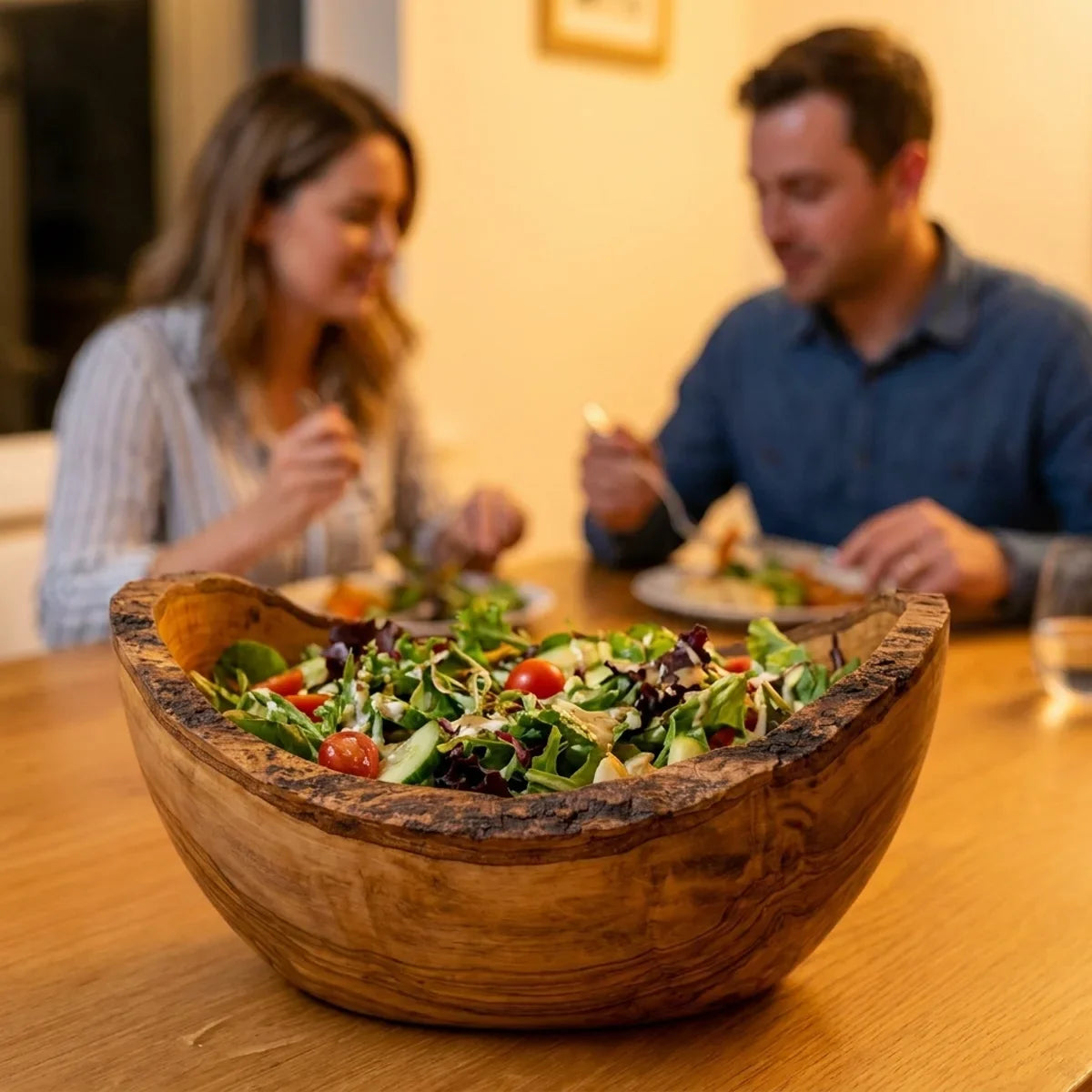 The bowl on a dinner table filled with a green salad