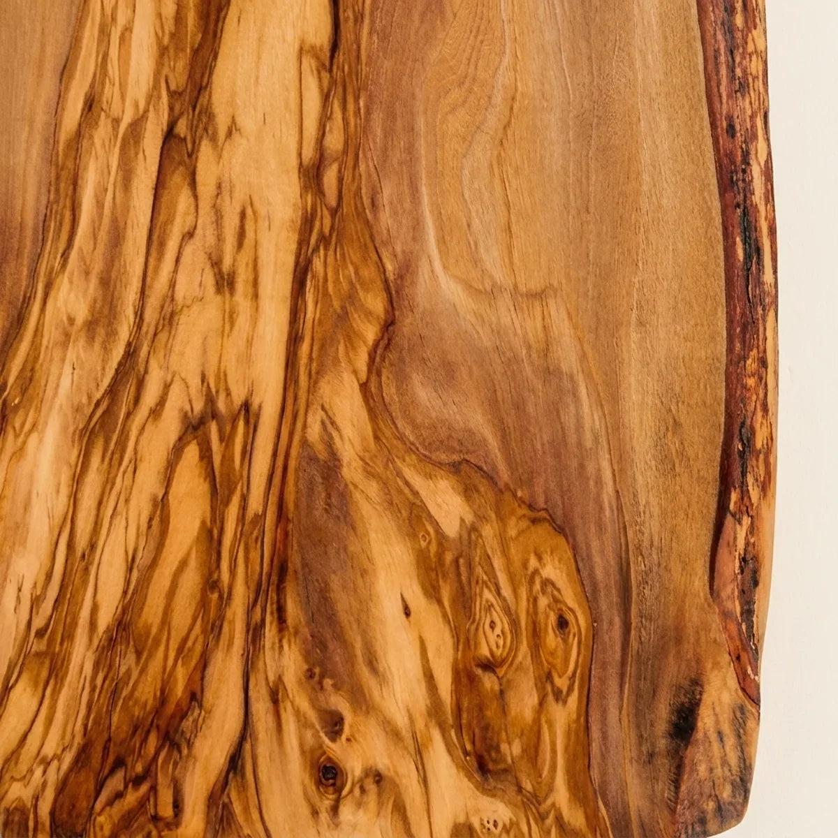 Macro of the olive grain of the Alba Live-Edge Olive Wood Slab