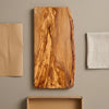 The Alba Live-Edge Olive Wood Slab with its kraft wrapping and plain shipping box